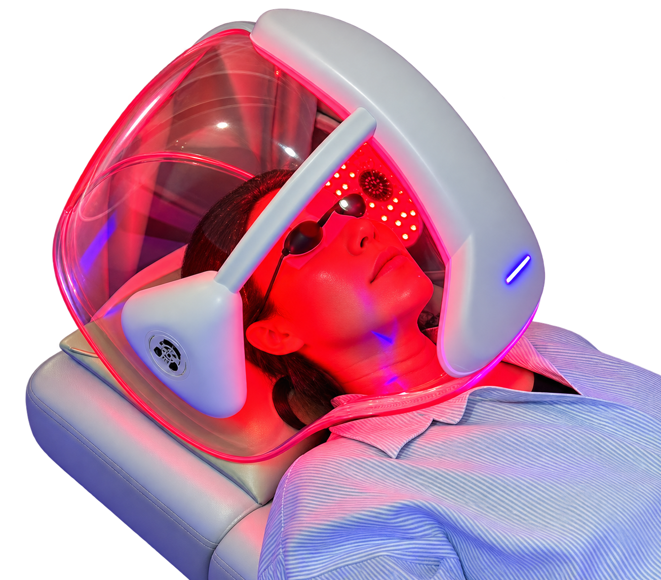 Customer relaxing beneath the Oxygen Dome with red LED light therapy
